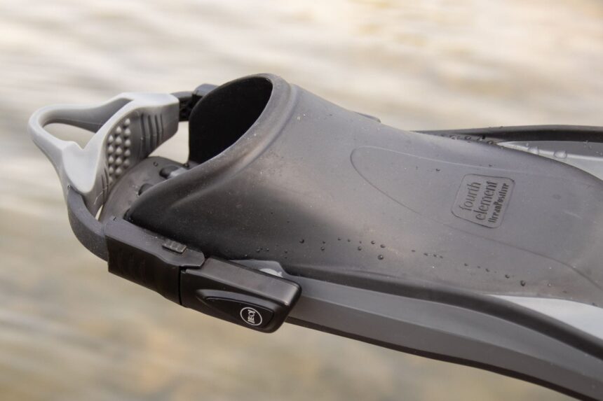 Fourth Element Rec fin foot pocket and buckle in close-up with the branded blade logo