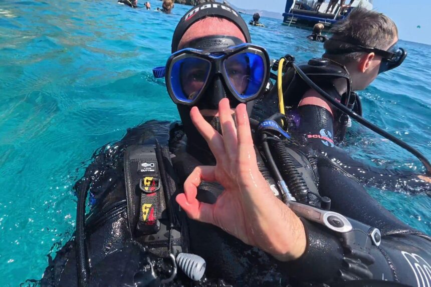 Surface OK Signal Before The Descent DIVEIN tester giving the OK sign at the surface in the Mares Magellan before descending