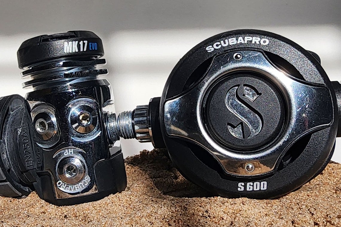 ScubaPro MK17 EVO first stage and S600 second stage resting on sand