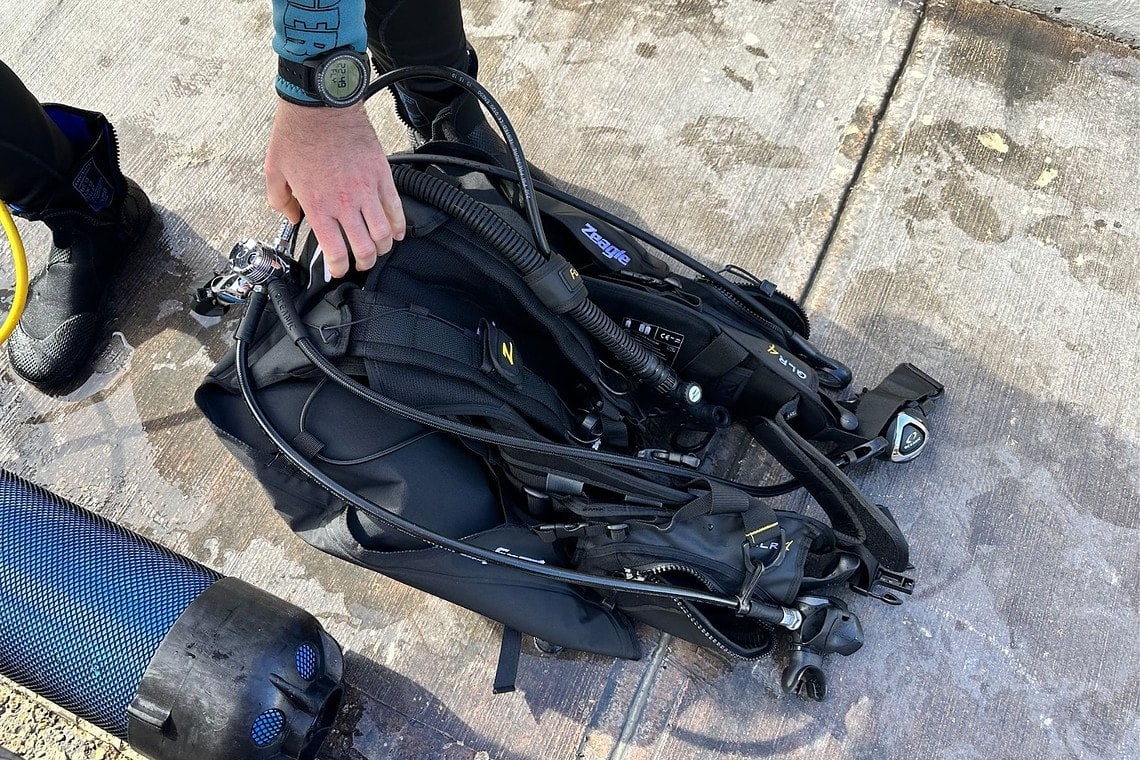 Our tester laying the Zeagle Fury BCD out on the dock with no tank fitted