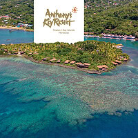 Aerial view of Anthony's Key Resort's private island in Roatan surrounded by coral reef