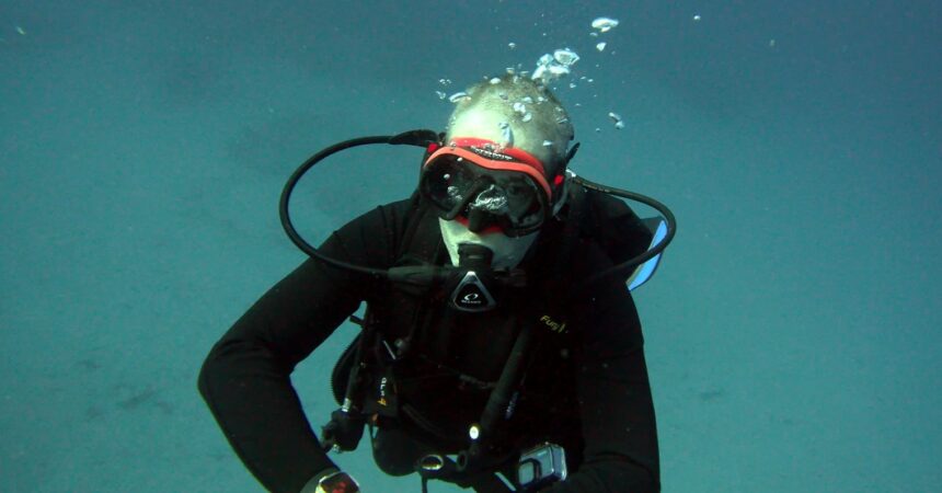 DIVEIN tester facing the camera mid-water while diving the Zeagle Fury BCD