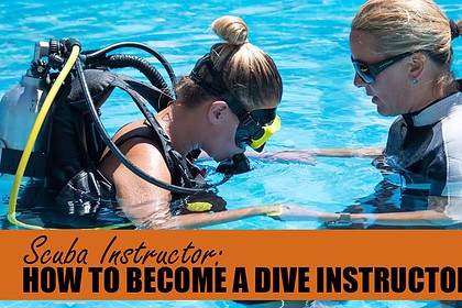 Scuba instructor guiding a masked student through skills training in a swimming pool
