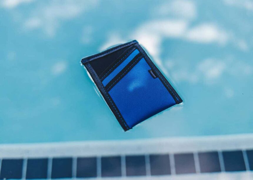 Reborn Rubber Wallet Floating Reborn Rubber wallet floating on the surface of a pool