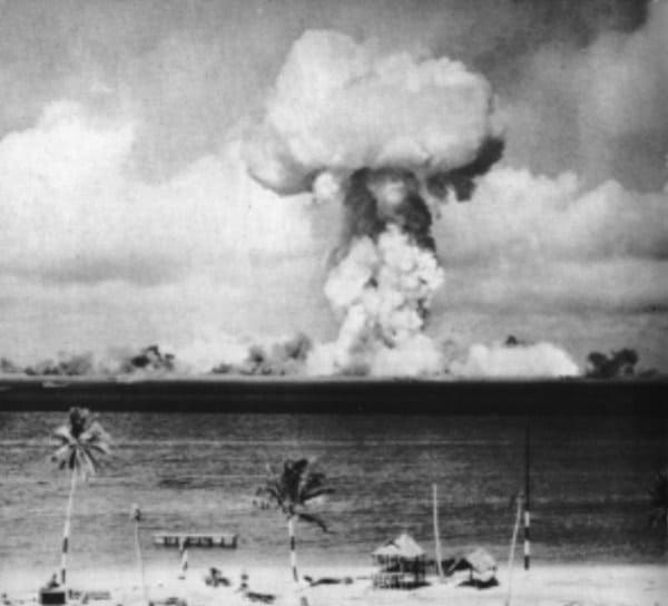 Mushroom cloud from the Able nuclear test rising over Bikini Atoll's lagoon during Operation Crossroads