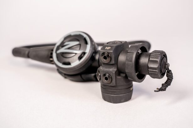 Zeagle F8 first stage in the foreground with its connection knob and lanyard, second stage behind