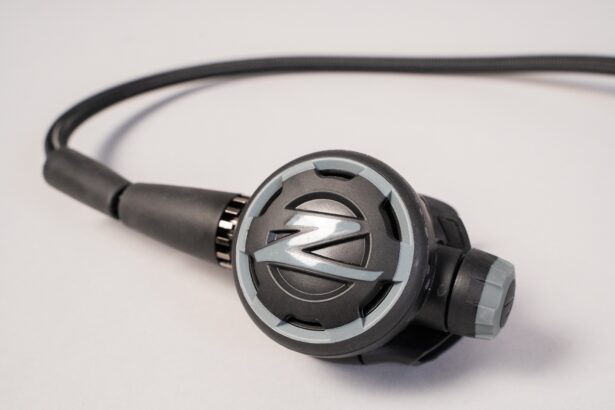 Zeagle F8 second stage seen from above with the hose attached and the purge cover facing up