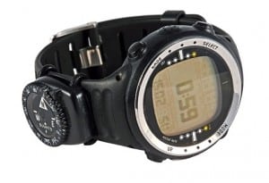 Black dive computer wristwatch with digital depth and time display on a white background