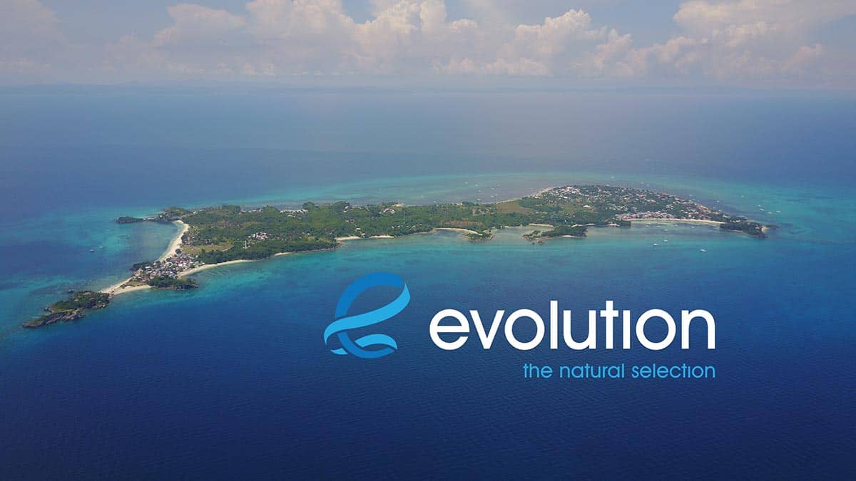 Aerial view of Malapascua island with the Evolution Diving Resort logo overlaid