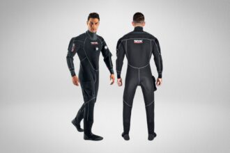 SEAC Warmdry 4mm neoprene drysuit shown front and back on a model with a cargo thigh pocket