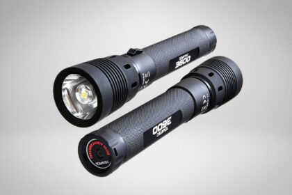 Tovatec Fusion 3600 dive light shown from the front and the tail, with the LED head and red pressure valve visible