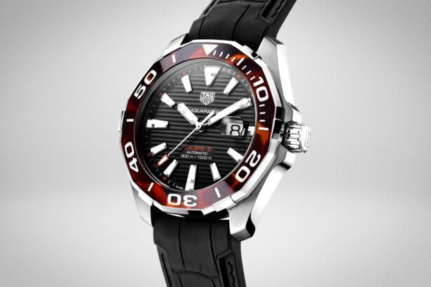 TAG Heuer Aquaracer Calibre 5 automatic dive watch with black dial, burgundy bezel and black rubber strap