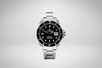 Rolex Submariner with black dial, black bezel and a stainless steel Oyster bracelet