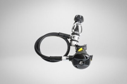 Cressi AC2 first stage and XS2 second stage regulator with a coiled hose on a grey background