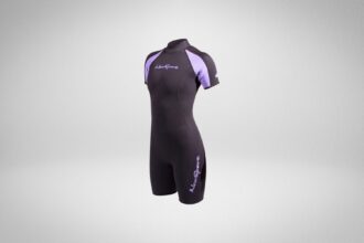 NeoSport 3mm women's shorty wetsuit in black with lavender shoulder panels, angled front view