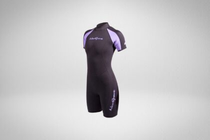 NeoSport 3mm women's shorty wetsuit in black with lavender shoulder panels, angled front view