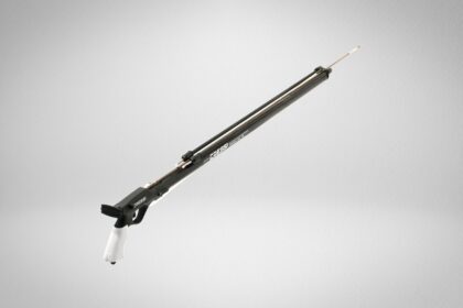 Cressi Comanche band speargun shown at an angle with black barrel and white handle grip