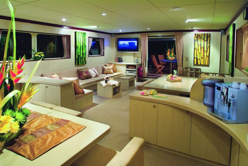 Comfortable lounge and dining salon aboard the Pelagian liveaboard