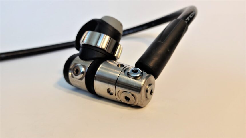 Close-up of the polished swivel joint where the hose meets the Atomic Aquatics TFX