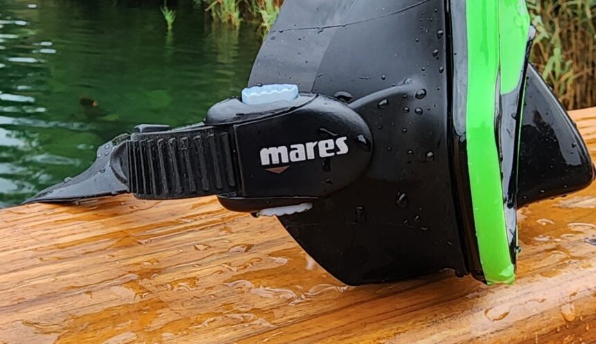 Mares X-Vision Buckle Close-Up Close-up of the Mares buckle and strap adjuster on the wet X-Vision mask frame