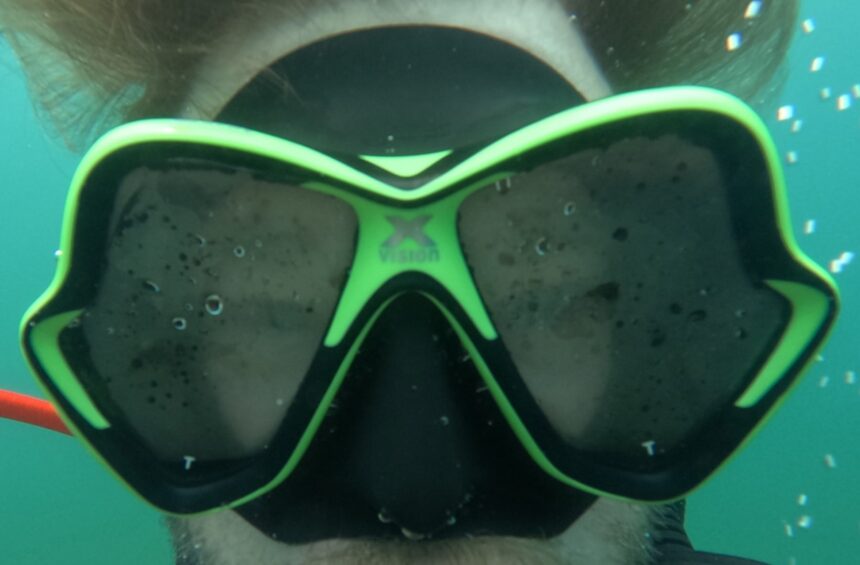 Close-up of the Mares X-Vision skirt sealing against our tester's face underwater