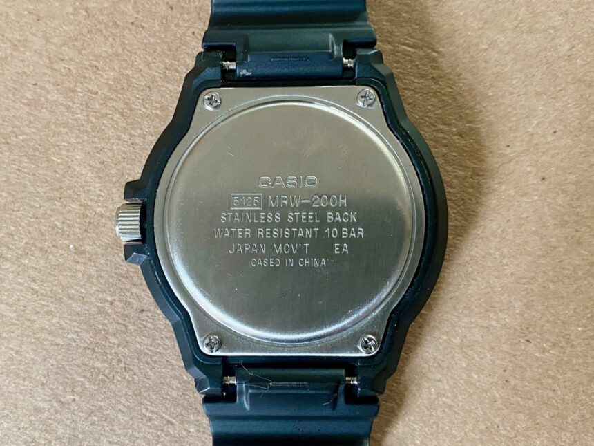 Stainless steel caseback of the Casio MRW200H engraved with its 10 bar water resistance