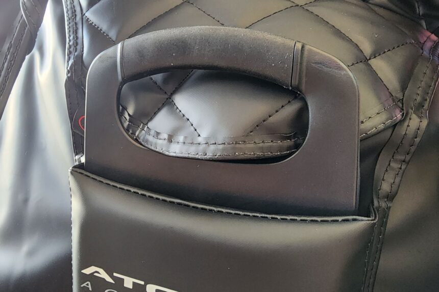 Padded carry handle stitched into the quilted back panel of the Atomic Aquatics BC2
