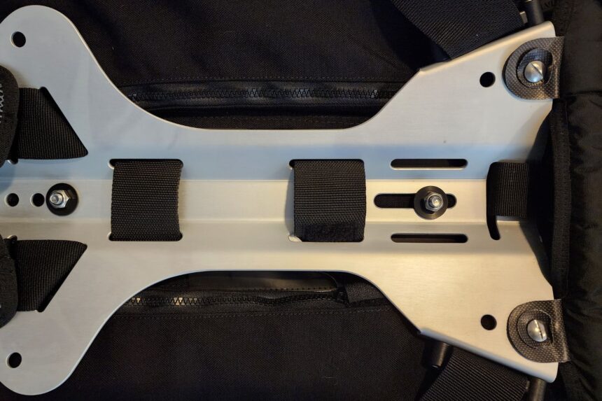 Lightweight aluminum backplate bolted to the Cressi Aquawing wing and harness webbing