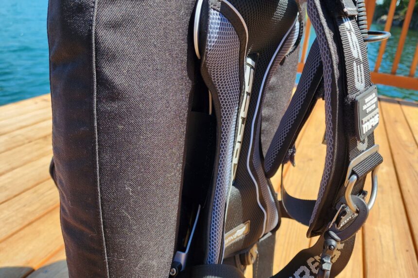 Mesh backpad and padded shoulder straps on the Cressi Aquawing harness next to the wing