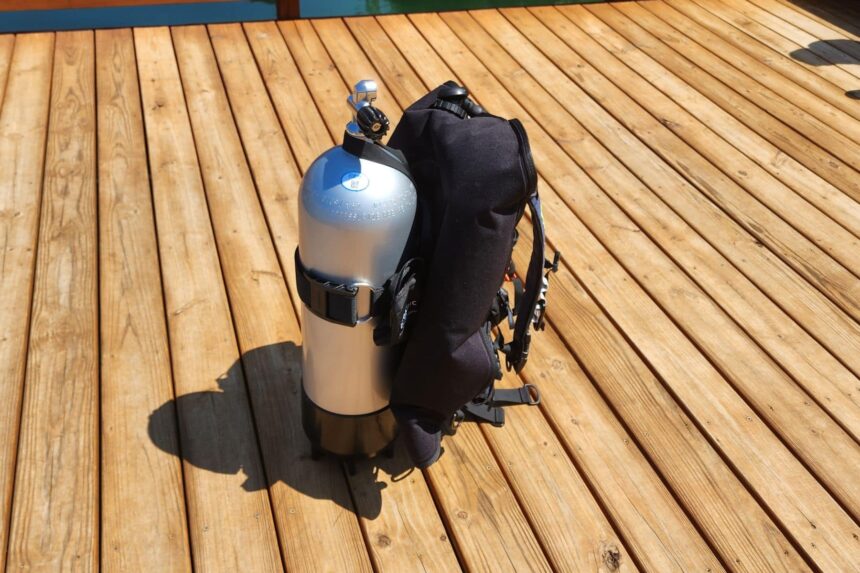 Oceanic Biolite inflated and standing upright on its tank on a wooden dock