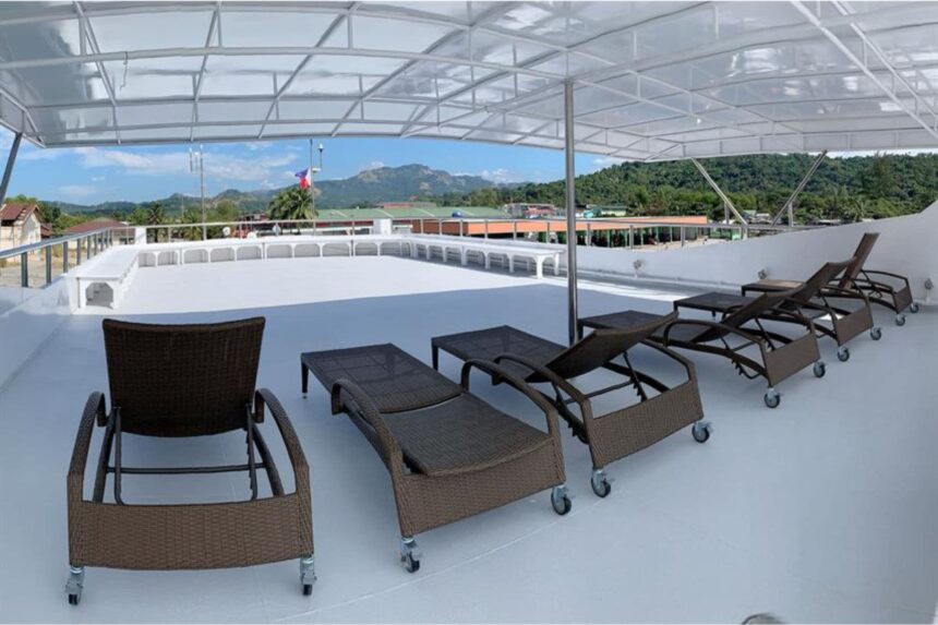 row of wicker lounge chairs on the Infiniti's covered sundeck
