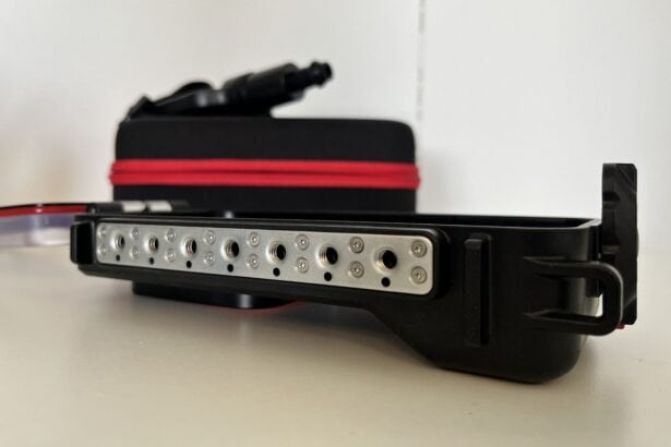 Close-up of the SeaLife SportDiver Ultra tray and its perforated mounting rail