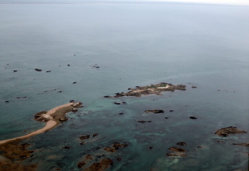 Aerial view of Les Écréhous rocky islets and sandbars off Jersey